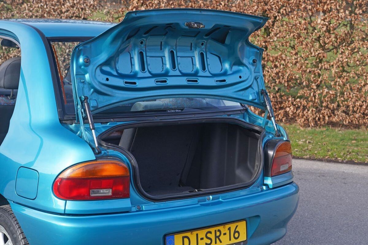 Mazda 121 with bear rims