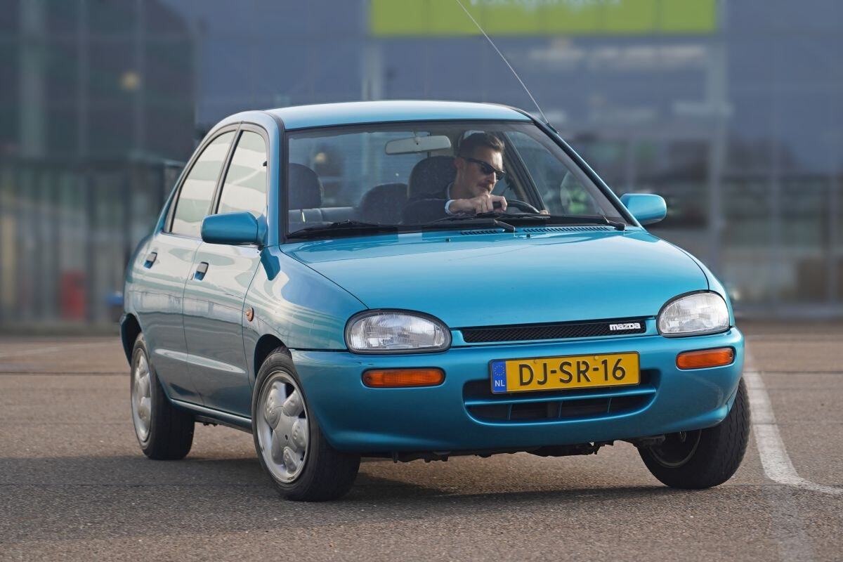 Mazda 121 with bear rims